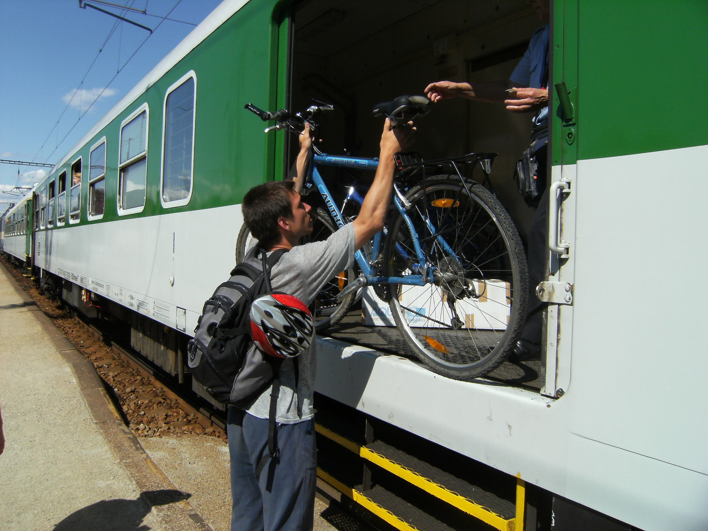 Loading bicycles onto a Czech train during the Panďulák expedition