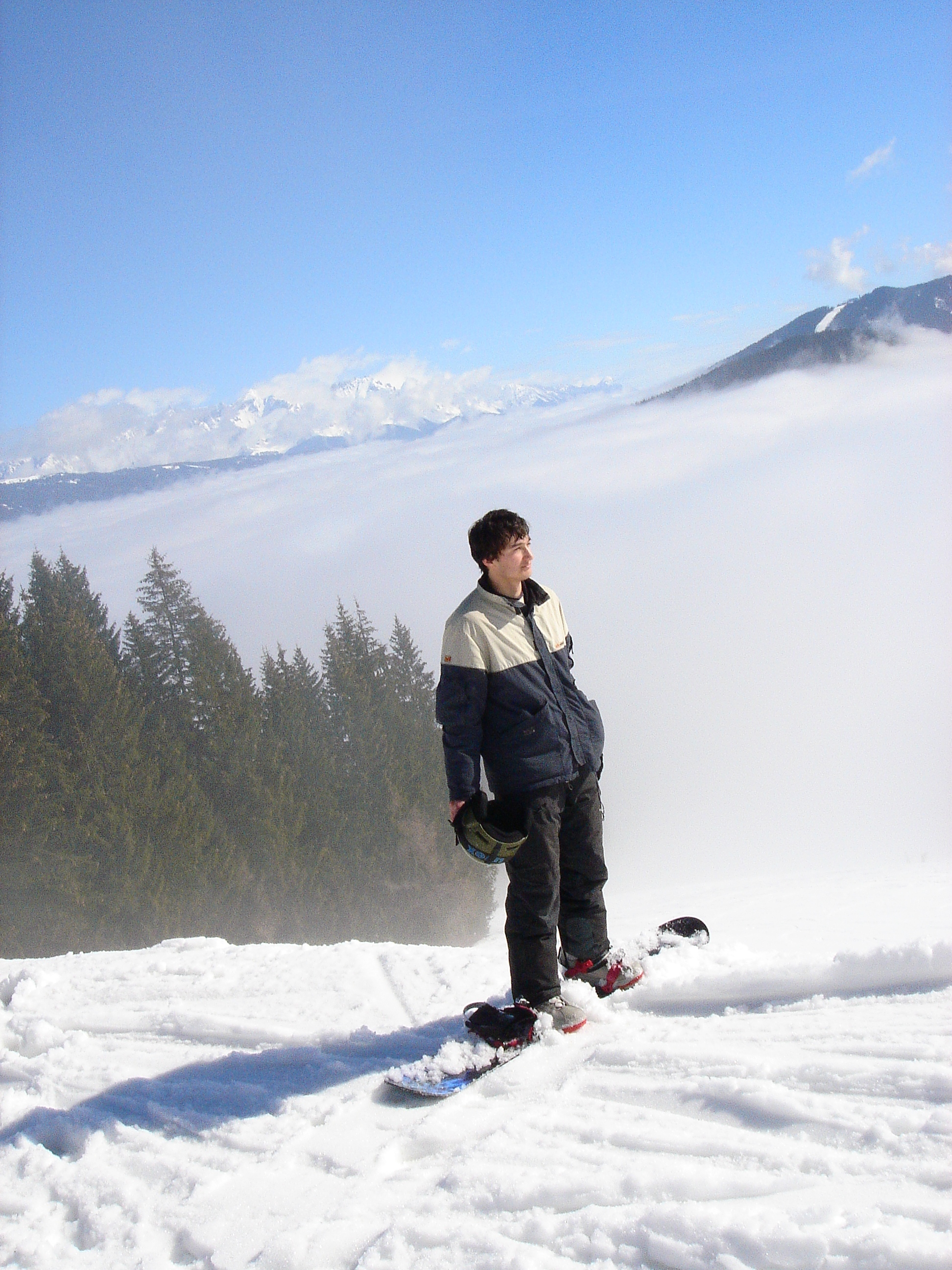 Snowboarding above the clouds in the Austrian Alps